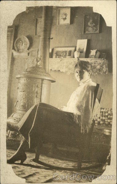 Woman sitting in rocking chair Women