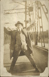 Man Standing on South Washington Street Bridge Postcard