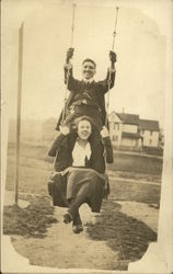 Man And Woman On A Swing Postcard