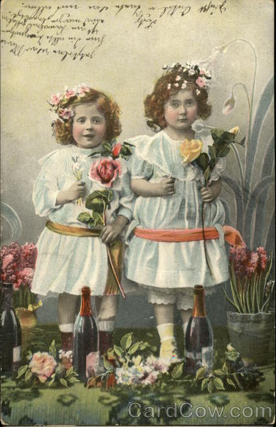Two Girls Holding Flowers