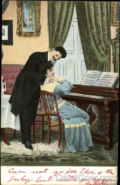 Man in Suit Hugging Woman in Blue Gown Seated at Piano