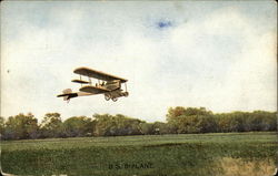 US Biplane - Aeroplane Preparing to Land in Field Postcard