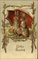 Easter Greeting - Two Brown Bunnies Under Large Umbrella Carrying Eggs in Baskets Postcard