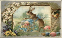 A Happy Easter - Bunny with Colorful Eggs in Cart, Hen and Baby Chicks look on With Bunnies Postcard Postcard