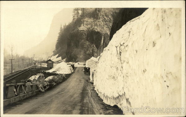Old Car Traveling on Road Past Large Snowbanks Athens New York