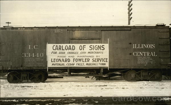 Carload of Signs for Good Charles City Merchants Made and Maintained by Leonard Fowler Service