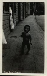 Street Scene, Black baby on sidewalk Panama Postcard Postcard
