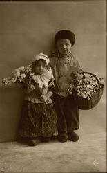 Portrait of Two Children Holding Flowers Postcard
