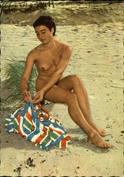 Nude Woman on Beach with Striped Towel Nude Woman on Beach with Striped Towel