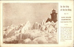 In the grip of the Ice King, Sand Island Lighthouse Bayfield, WI Postcard Postcard