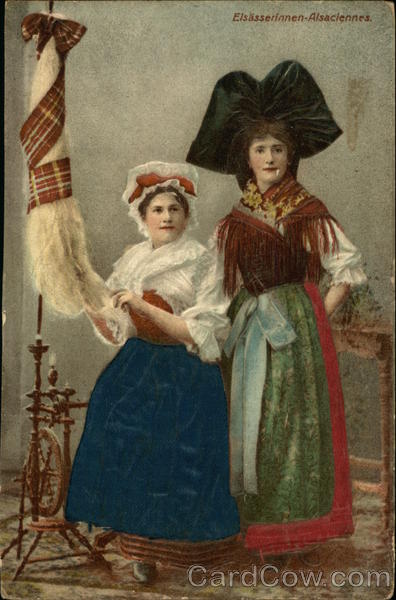 Two Women in Costume Spinning Wool