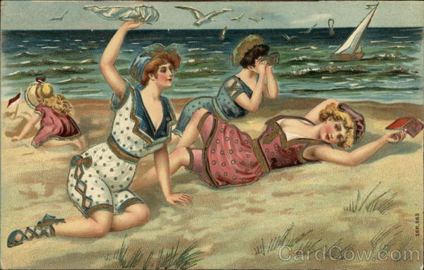 Three Women in Vintage Bathing Suits Lying on Beach