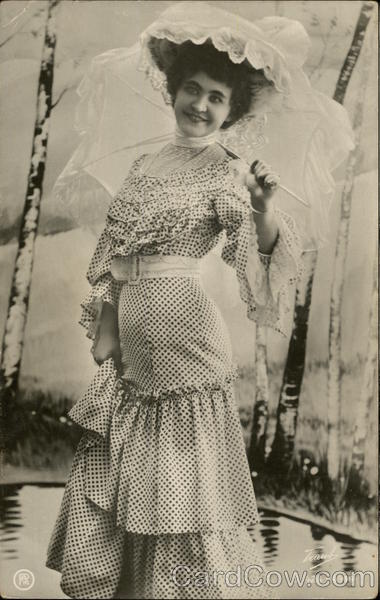Woman in Ruffled Polka Dot Dress and Ruffly Hat Women