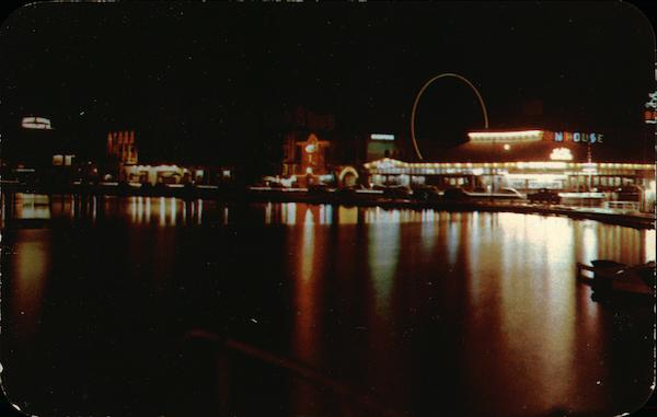 Night Scene of the Amusement Section at Asbury Park with Wesley Lake in the Foreground New Jersey