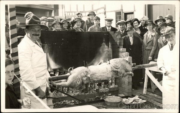 Boy Scouts Spit Roasting a Hog