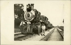 Four Men Near Locomotive 8573 Postcard