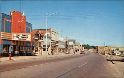 Street View of Business District Postcard