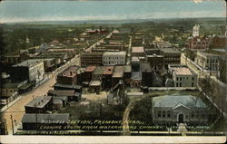 Business section looking south from waterworks chimney Postcard