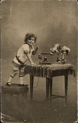 Photographic portrait of a child by a telephone Postcard