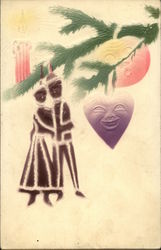 Laughing ornaments on a Christmas tree bough Laughing ornaments on a Christmas tree bough