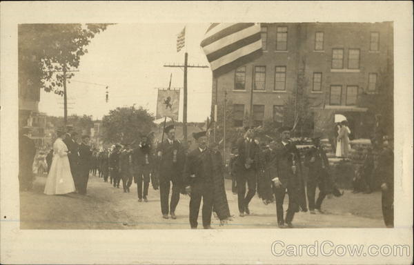 Bagpipe troop in an early 20th century parade Patriotic