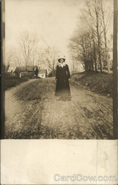 Outdoor photograph of a woman in the early 20th century