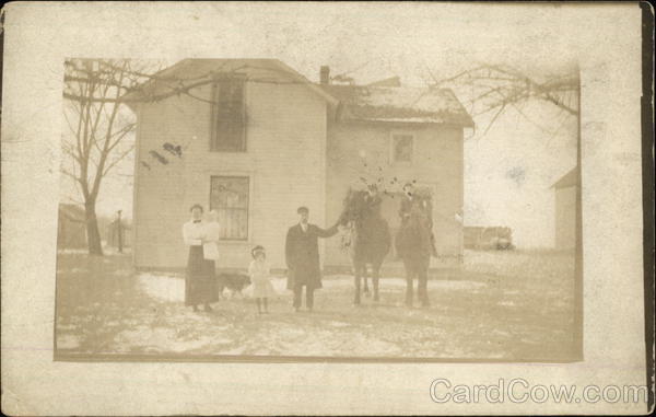 Family photo in front of their home in the early 20th century McComb Ohio