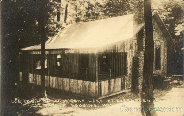 Log cabin on Sugarcamp Lake at Evergreen Road Robbins Wisconsin