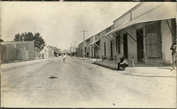 Street view of a small town in Mexico in early 20th century Postcard