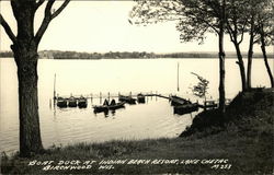 Boat dock at Indian Beach Resort, Lake Chetac Birchwood, WI Postcard Postcard