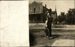 Street Scene with Man, Dog, Old Buggy Wagon Postcard