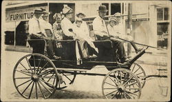 Photograph of a horse-drawn carriage with passengers Postcard
