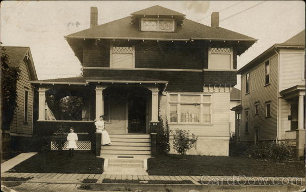 Woman and Child in Front of House Arts & Crafts Portland Oregon