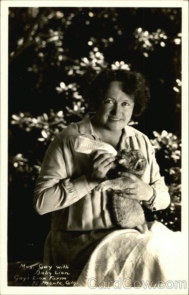 Mrs. Gay Feeding Baby Lion - Gay's Lion Farm El Monte California