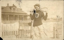 Woman Holding a Tennis Racket Postcard