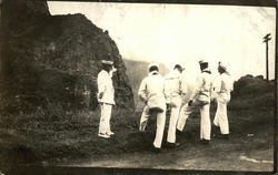 Uniformed sailors on shore, Hawaii Postcard