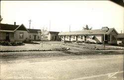 Long's Deluxe Auto Court Motel Cabins Postcard