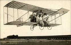 Biplane With Passengers Flying Over Beach Postcard
