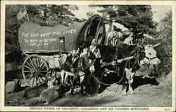 Orville Ewing of Pritchett, Colorado and His Touring Menagerie Postcard