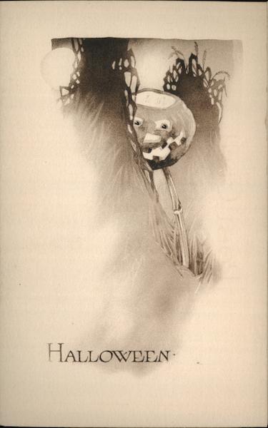 Jack O'Lantern Peering From Behind Haystack Halloween