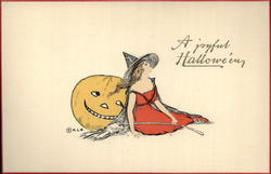 Witch Dressed in Red Leaning Against Jack O'Lantern Postcard