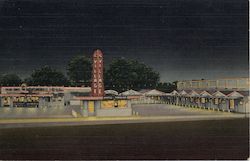 The Village Motel at Night Postcard