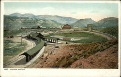 View of Town and Railroad Station Gardiner, MT Postcard Postcard Postcard