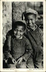 Two African American Boys Smiling By Tree Two African American Boys Smiling By Tree