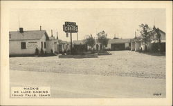 Mack's De Luxe Cabins Postcard