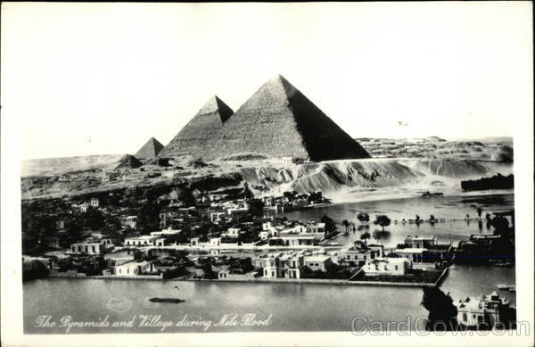 The Pyramids and Village during Nile Flood Egypt Africa