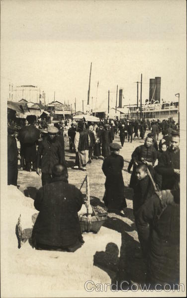 Group of Chinese People near a Dock China