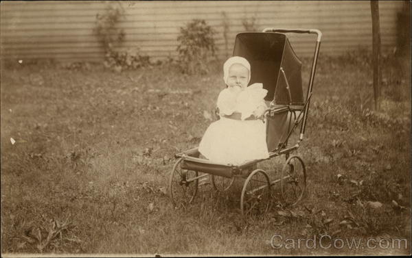 Baby Wearing White in Stroller Babies