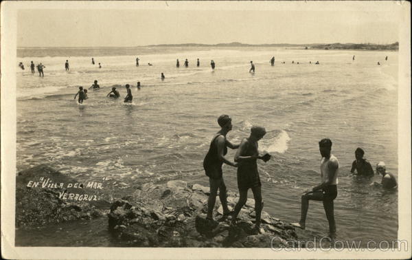 People Playing in the Ocean Water Swimming