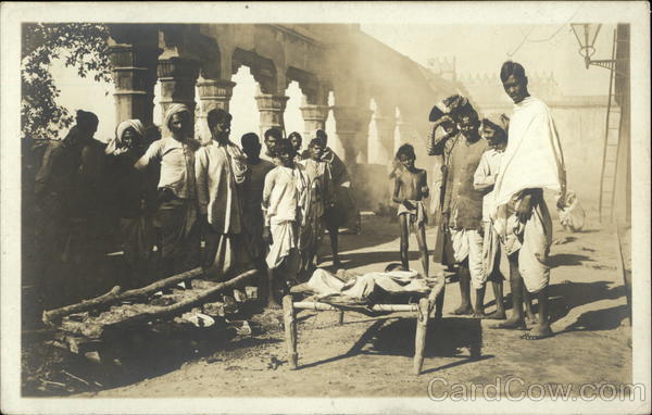 A Burning Ghat -Wood Pile Ready, Deceased Body on Bed Awaiting Ceremony Calcutta India